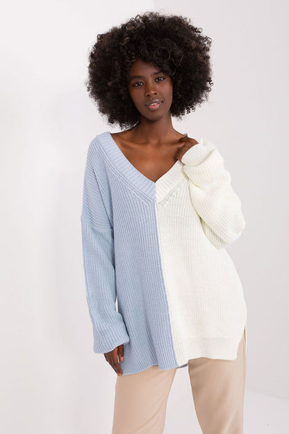 Elegant two-tone women's acrylic wool long sleeve sweater by Badu featuring a stylish heart neckline and subtle side slits, perfect for a fashionable and refined casual look.