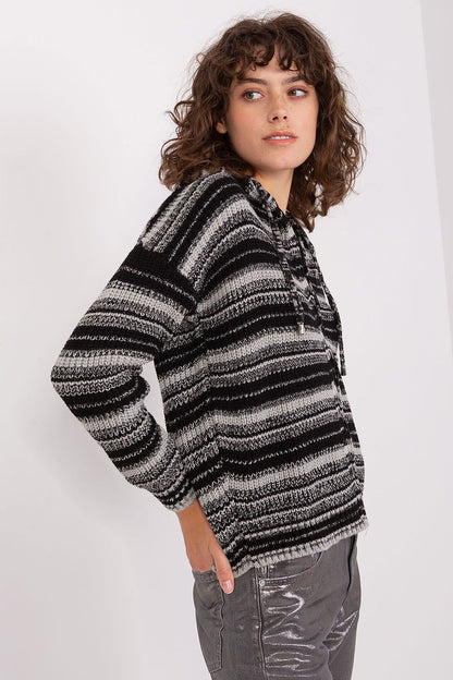 Fashion-forward striped cardigan from Badu, offering a unique zip-up design and a comfortable hood, perfect for everyday elegance and warmth.