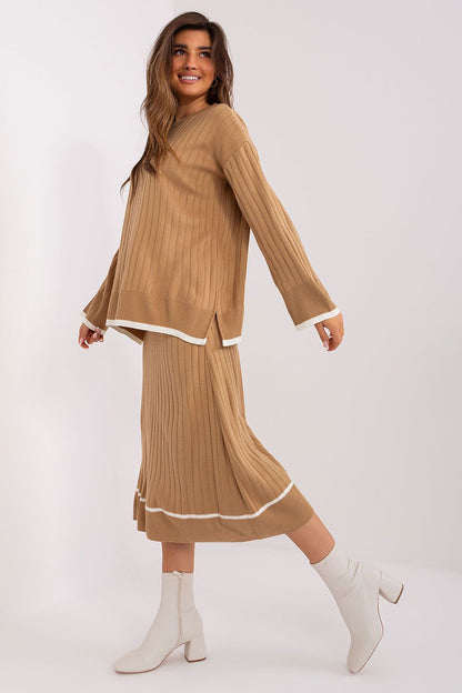 Badu luxury knitted set displayed elegantly on a hanger, showcasing its premium acrylic and wool blend, perfect for a stylish wardrobe.