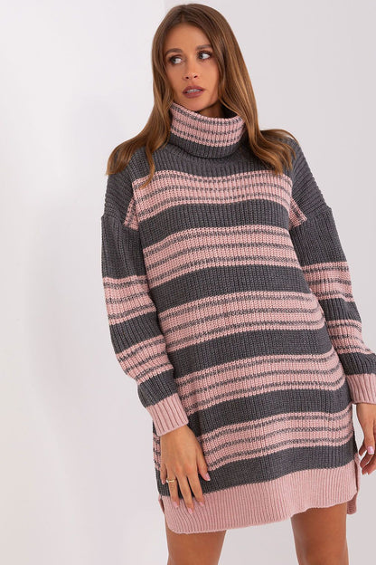 Luxurious oversized knit dress by Badu featuring vibrant colourful stripes and elegant turtleneck.
