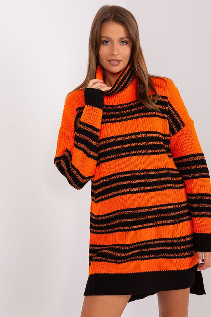 Versatile knee-length oversized knit dress by Badu, ideal for a chic yet casual look with colourful stripes.