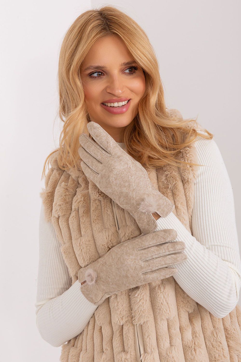 Elegant insulated women's gloves by AT featuring a decorative geometric pattern and stylish pompoms at the wrists.
