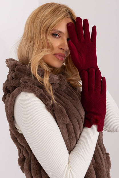 Elegant women's insulated gloves by AT featuring a decorative geometric pattern and stylish pompoms at the wrists.