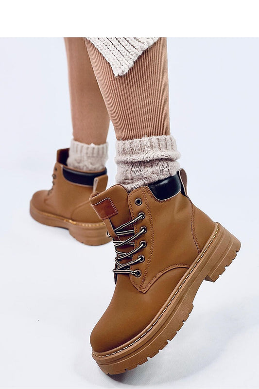 Elegant Inello women's trapper boots designed with traditional lacing and a protective sole, combining fashion and function in a versatile matte finish.