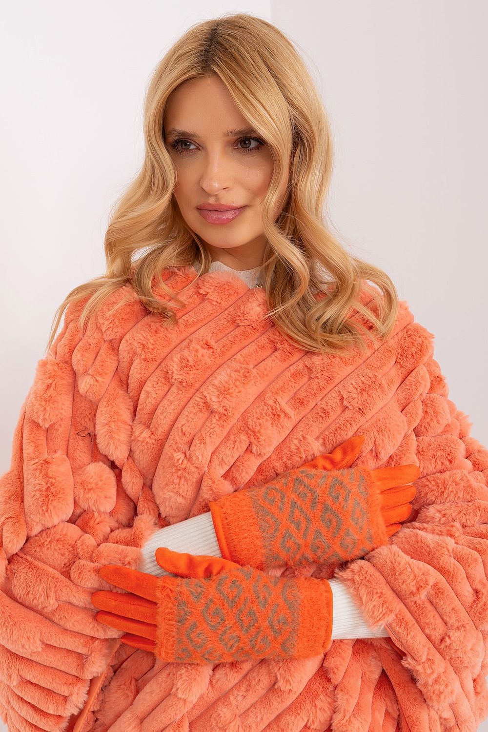 Sophisticated women's insulated gloves by AT with embroidered floral accents, perfect for cold weather and smartphone use.