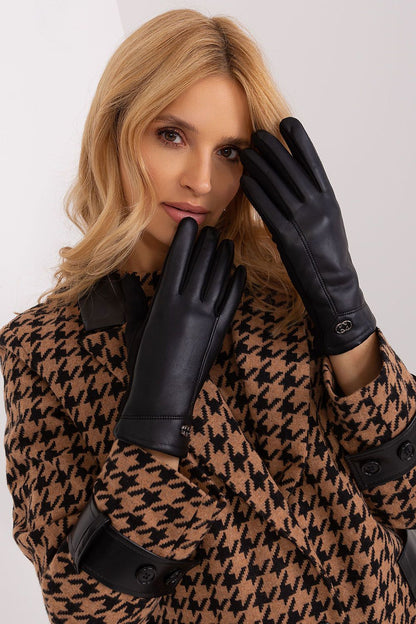 Close-up of elegant women's insulated gloves by AT with embroidered flower detail and touchscreen capability, showcasing luxurious design and functionality.