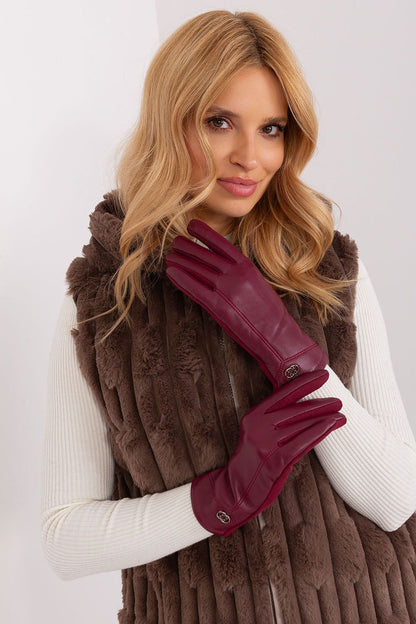 Close-up of the sophisticated embroidered flower design on AT's women's insulated gloves, emphasizing luxury and touchscreen functionality.