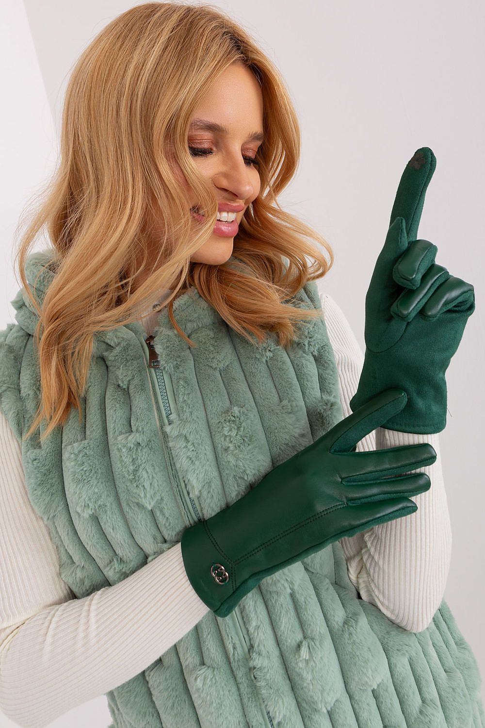 Luxurious women's gloves with intricate flower embroidery and touchscreen functionality, designed by AT for warmth and style.