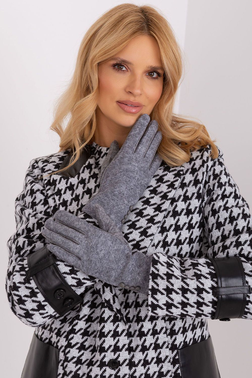Elegant women's cotton gloves by AT featuring a stylish geometric pattern, adorned with an embroidered flower on the touchscreen tip.
