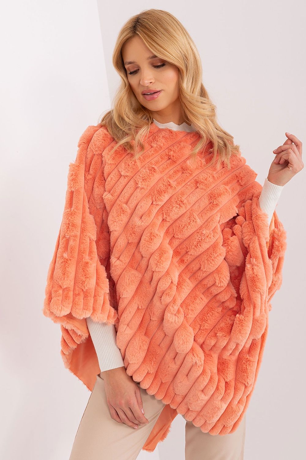 Elegant details of the high-quality polyester casual poncho by AT, highlighting its unique texture and premium craftsmanship.