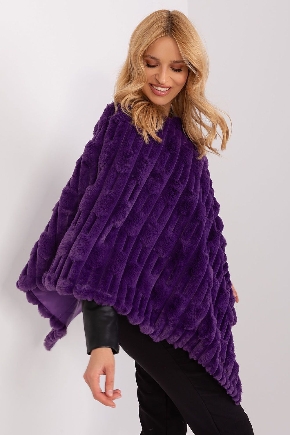 High-quality polyester poncho by AT, embodying luxury and versatility with its unique texture, perfect for everyday wear and chic occasions.