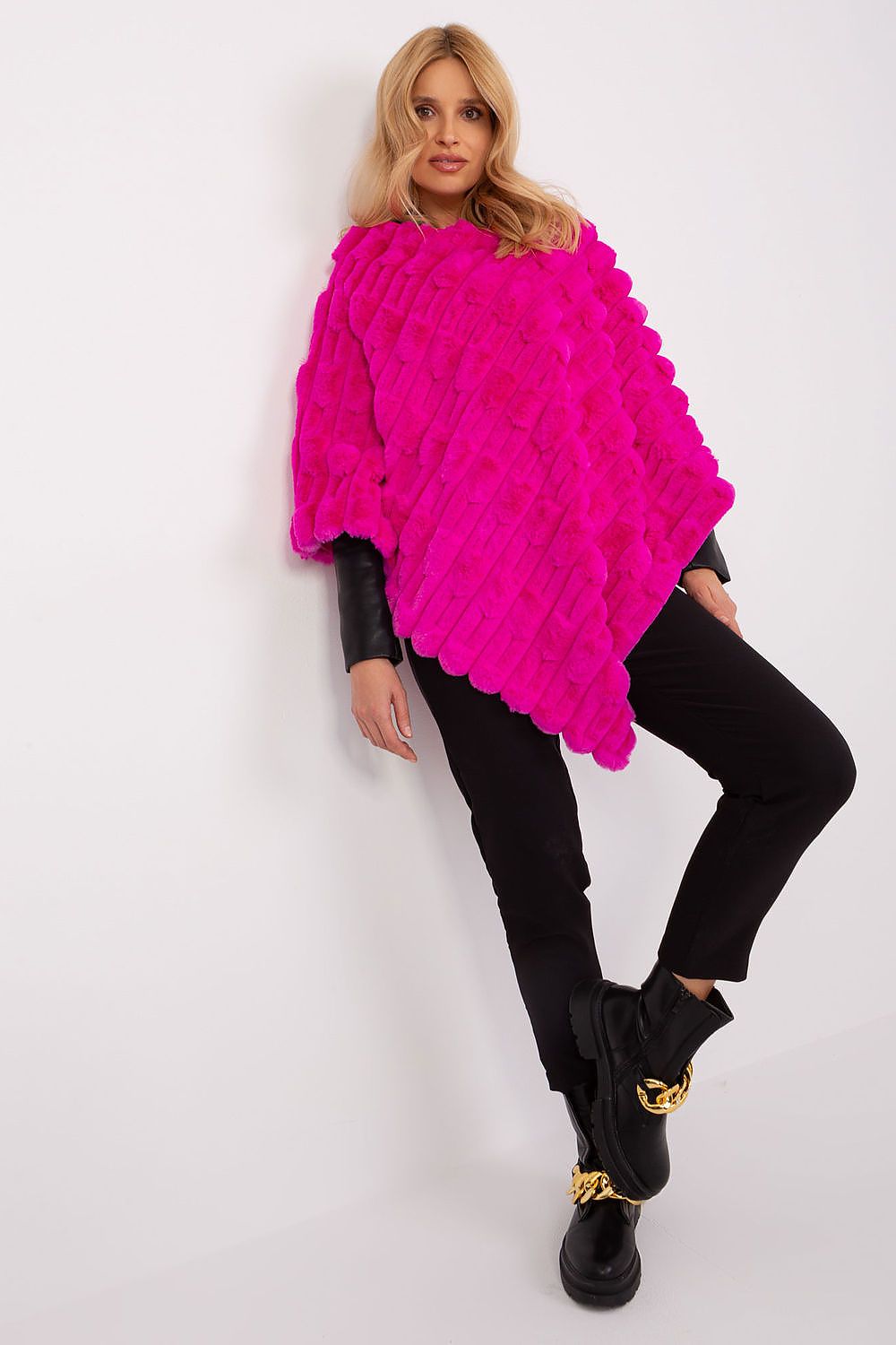 Fashionable poncho by AT, featuring a relaxed fit and high-quality materials, perfect for enhancing everyday luxury wear.