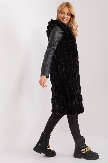Luxurious women's fur vest with hood from AT, featuring elegant design and practical zipper closure, perfect for winter fashion.