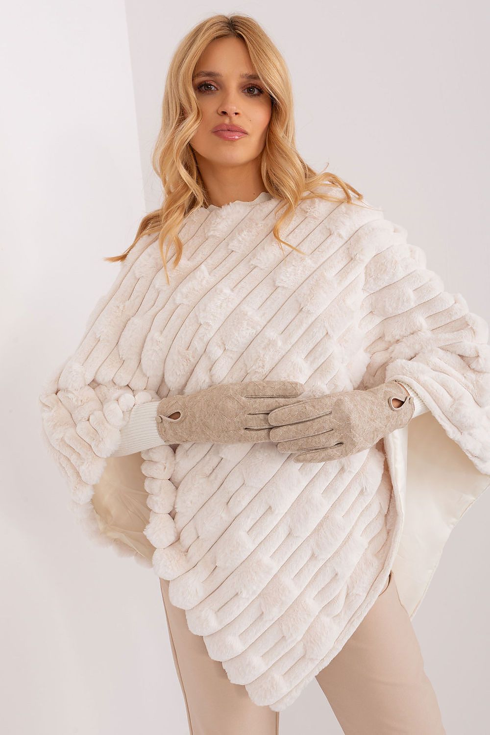 Fashionable and functional insulated women's gloves by AT, detailed with a geometric pattern and touch screen friendly embroidery.