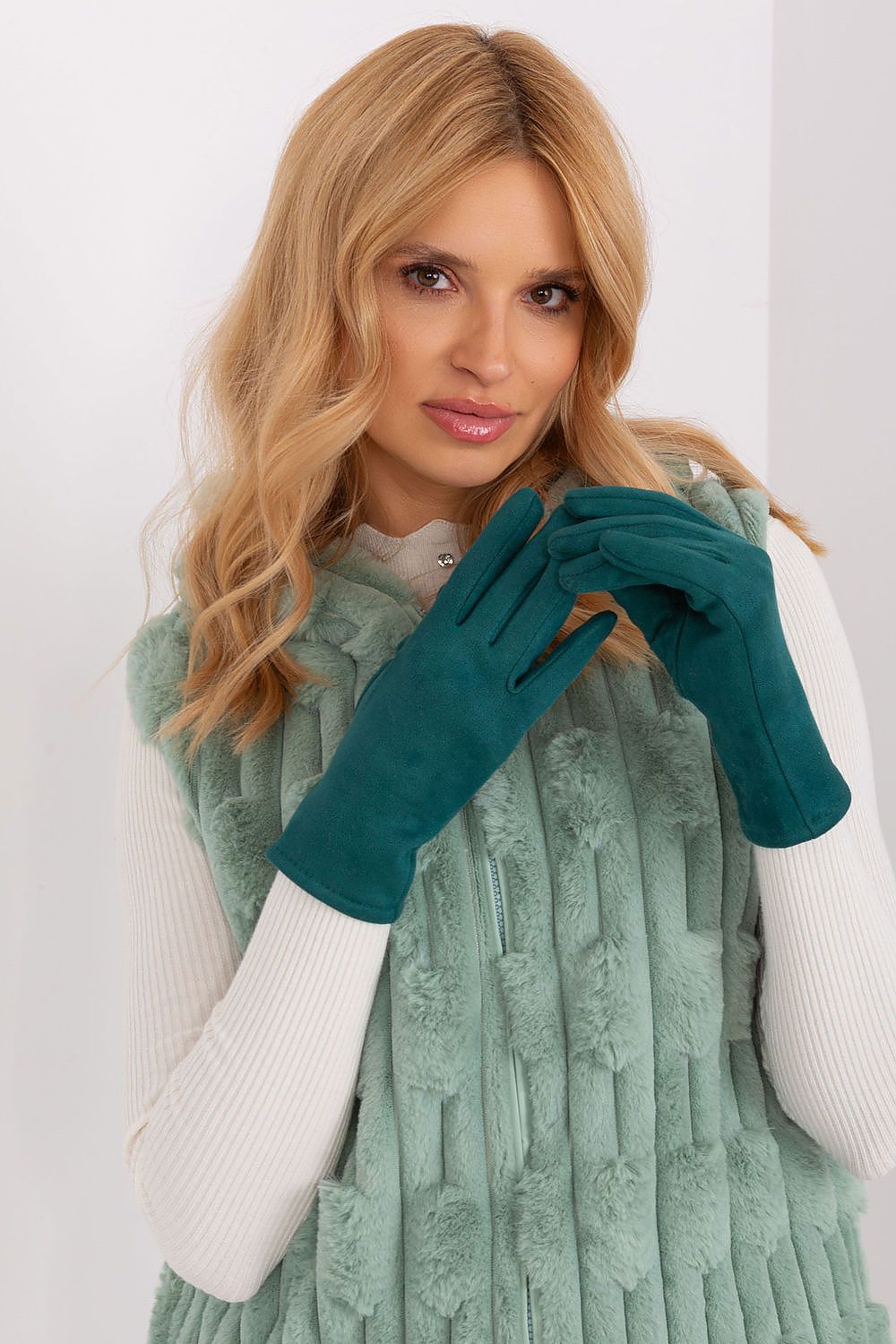 Luxurious women's touchscreen gloves crafted from soft material by AT, with delicate embroidered flower accents.