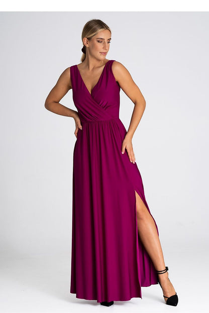 Chic and stylish Figl maxi dress displaying a beautiful V-neck and dramatic front slit, available in various sizes for a perfect fit.