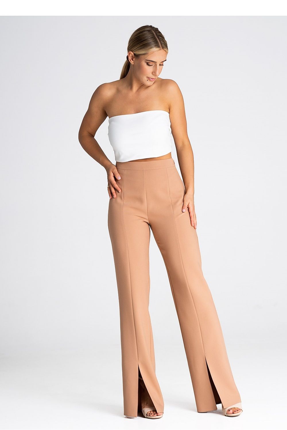 Elegant women’s Figl trousers with front slit, showcasing a chic design ideal for sophisticated style.