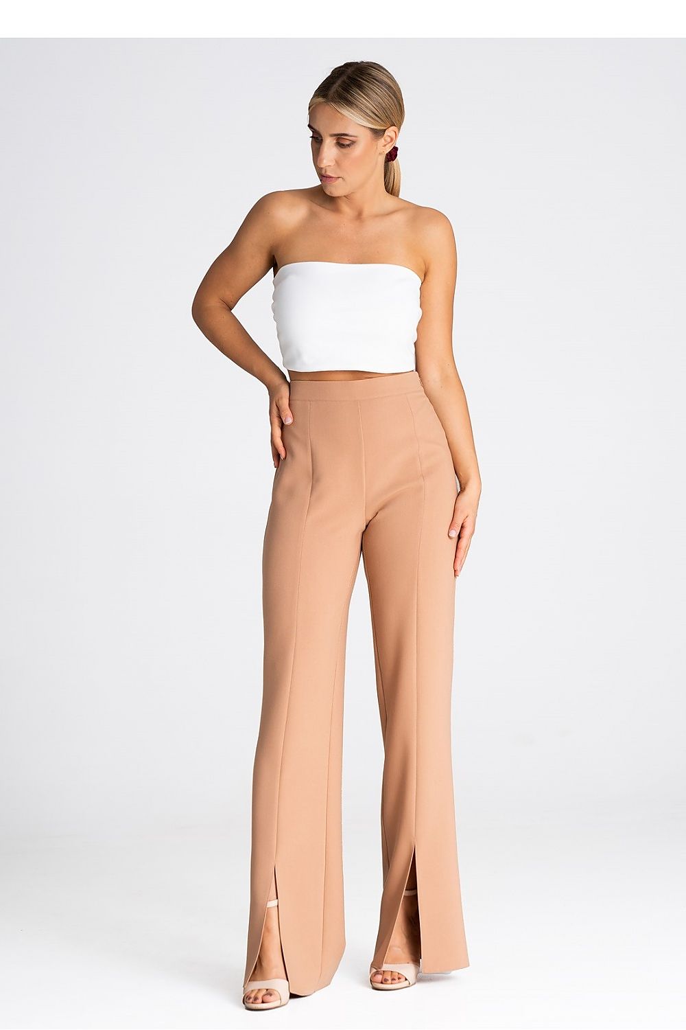 Elegant Figl trousers showcasing a refined design with a unique front slit detail.