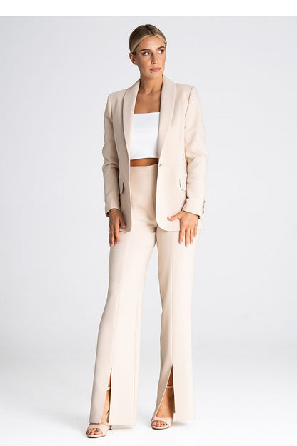 Luxurious Figl long pants with a striking front slit, combining comfort and sophistication.