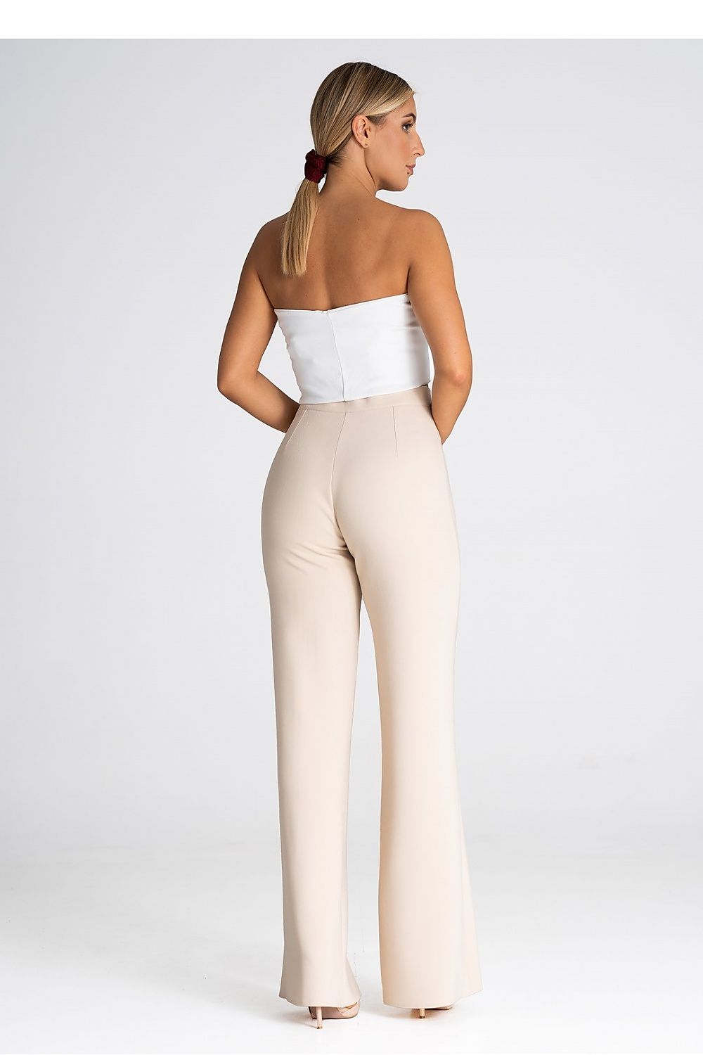 Elegant women's Figl trousers showcasing a classy front slit design, perfect for sophisticated style in luxury fashion.