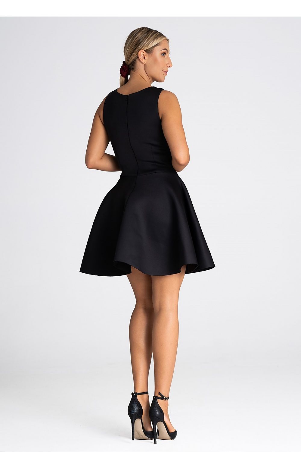 Elegant Figl cocktail dress featuring a fitted bodice and flared bottom, crafted from high-quality elastic polyester, ideal for special occasions.