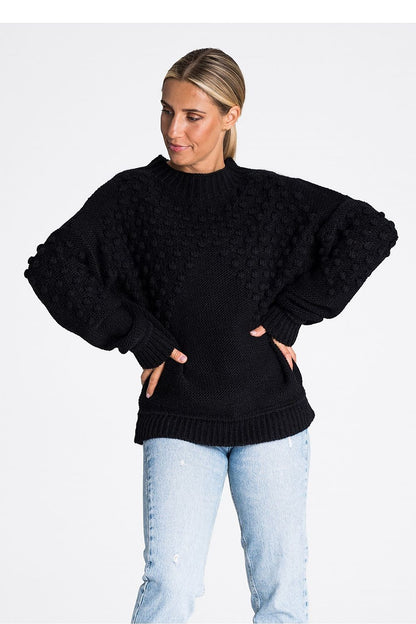 Elegant Figl long sleeve sweater with pom-poms and ribbed detailing in soft acrylic blend, perfect for luxurious winter styling.