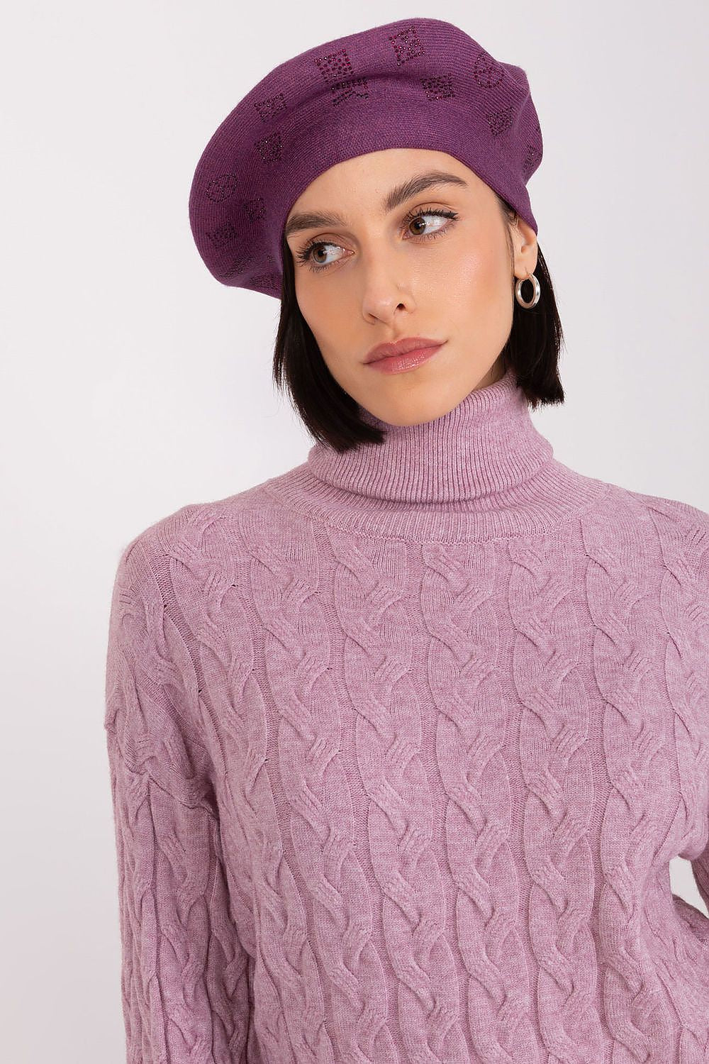 Upscale beret designed by AT, showcasing a unique rhinestone embellishment, made with premium 50% acrylic, 30% cotton, and 20% cashmere.