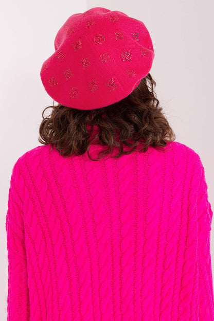 Chic knitted beret by AT with striking rhinestone design, made with a luxurious blend of 50% acrylic, 30% cotton, and 20% cashmere.