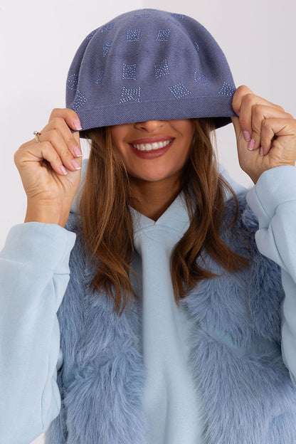 AT luxury beret showcasing a beautiful knitted design with rhinestone application, crafted from 50% acrylic, 30% cotton and 20% cashmere for warmth and style.
