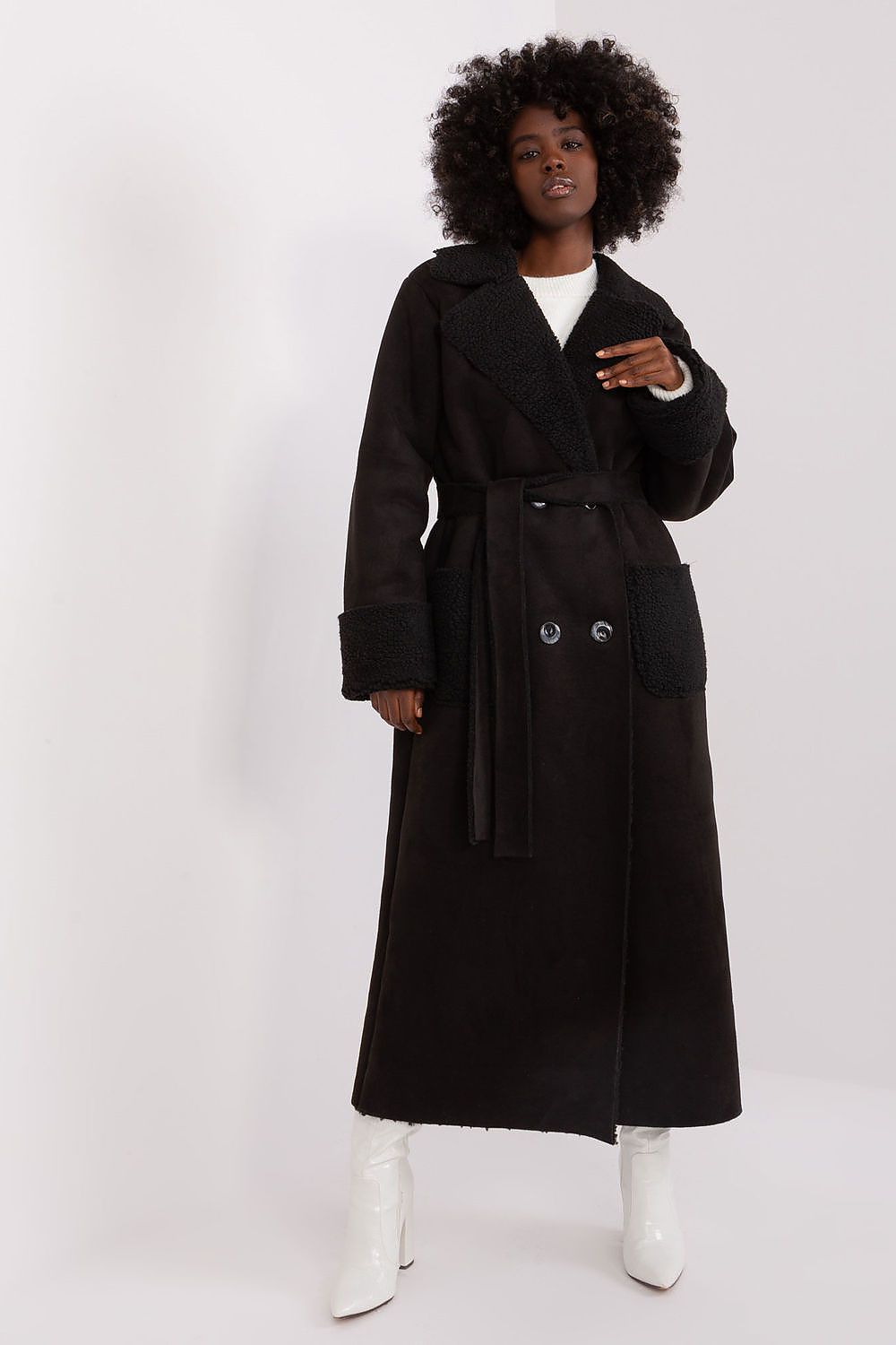 Side view of the Lakerta long winter coat, highlighting its unique texture and casual style suitable for everyday elegance.