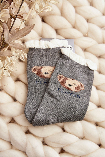 Stylish women's cotton socks adorned with a whimsical teddy bear design from Step in Style, offering warmth and luxury for the colder months.