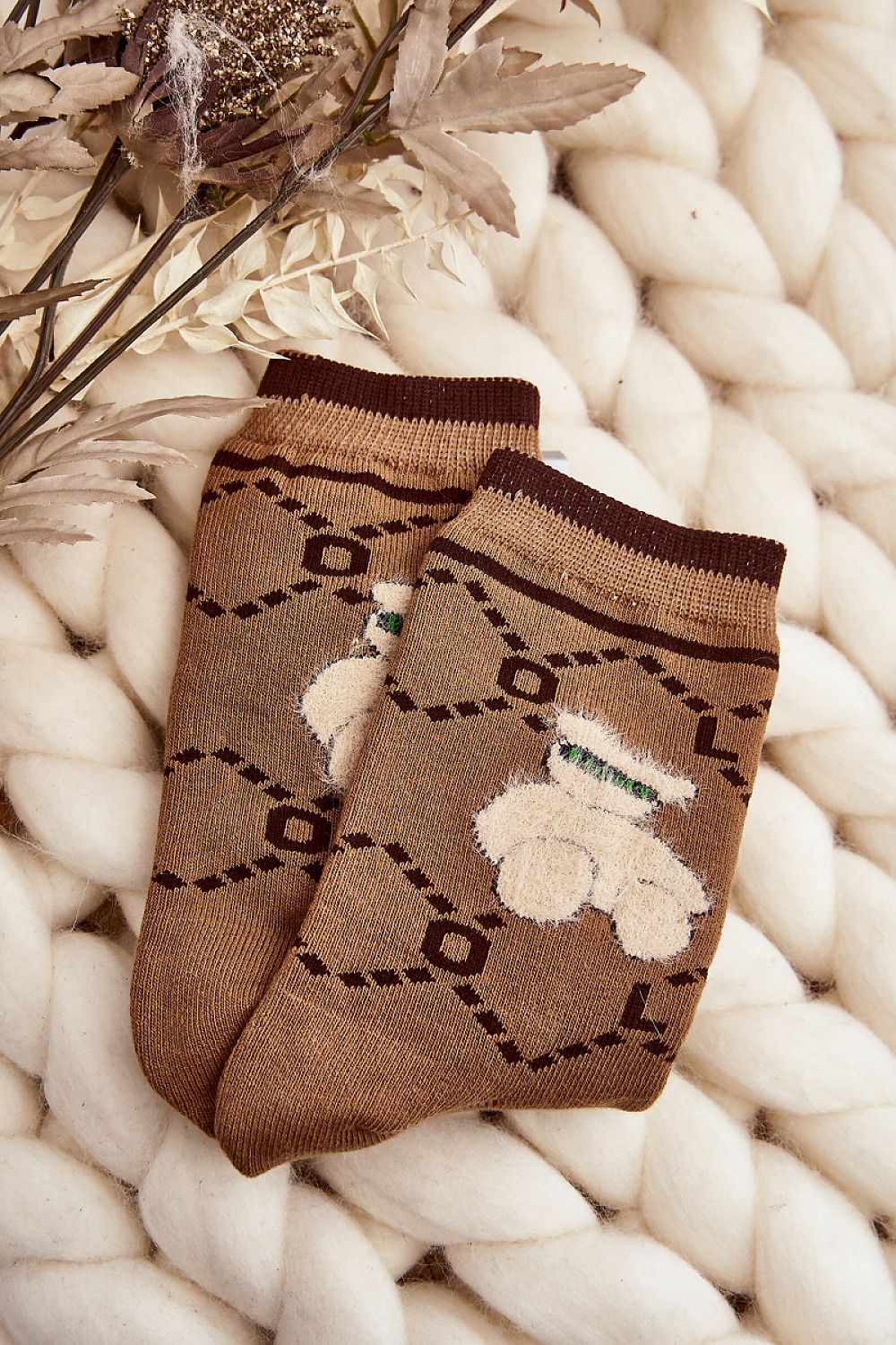 Luxurious women's cotton socks with a charming teddy bear patch, designed by Step in Style, perfect for keeping warm on cold days.