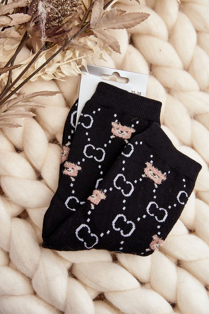 Step in Style luxurious warm cotton socks with teddy bear patch, showcasing vibrant colours and soft fabric for ultimate comfort.