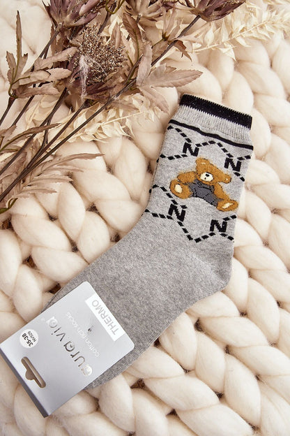 Elegant warm women's cotton socks featuring a charming teddy bear patch, designed by Step in Style for ultimate comfort.