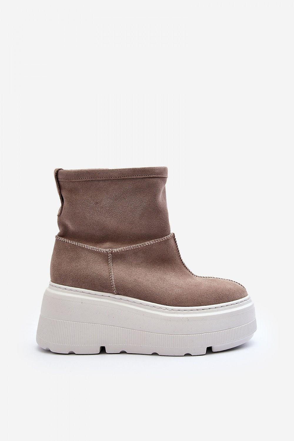 Chic and sophisticated Natural Leather Buskin Boots for women by Step in Style, showcasing a massive platform and a warm sheepskin interior for style and comfort.