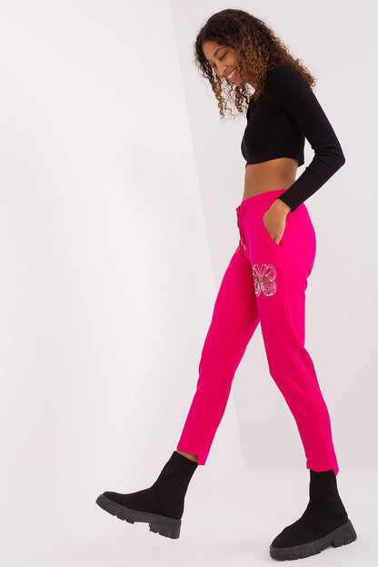 Elegant women's cotton blend tracksuit trousers in high waist design with rhinestone detailing by Relevance, perfect for stylish casual wear.