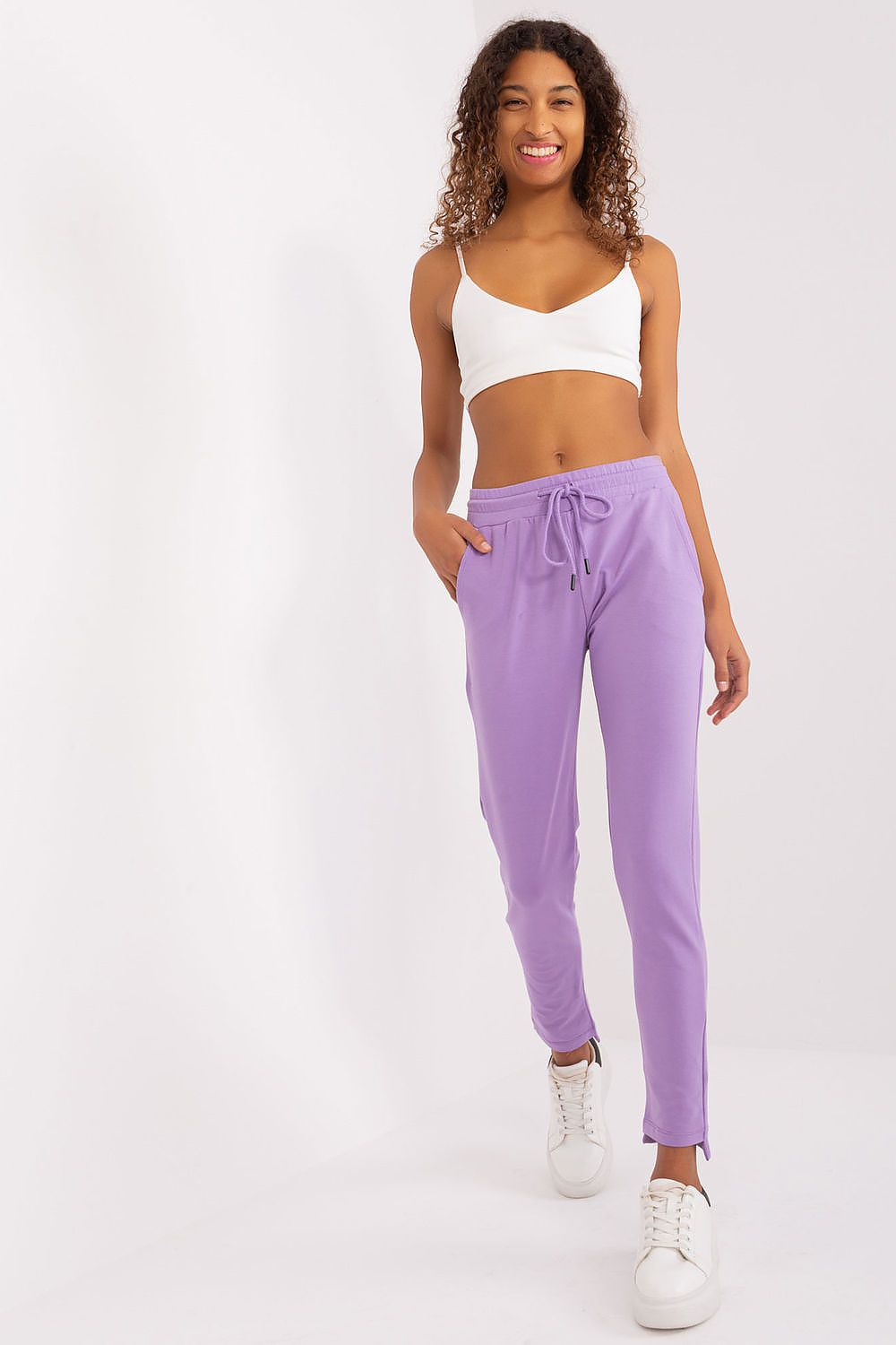 Elegant tapered leg women's sweatpants by Relevance, combining luxury comfort with a chic sporty style for active women.