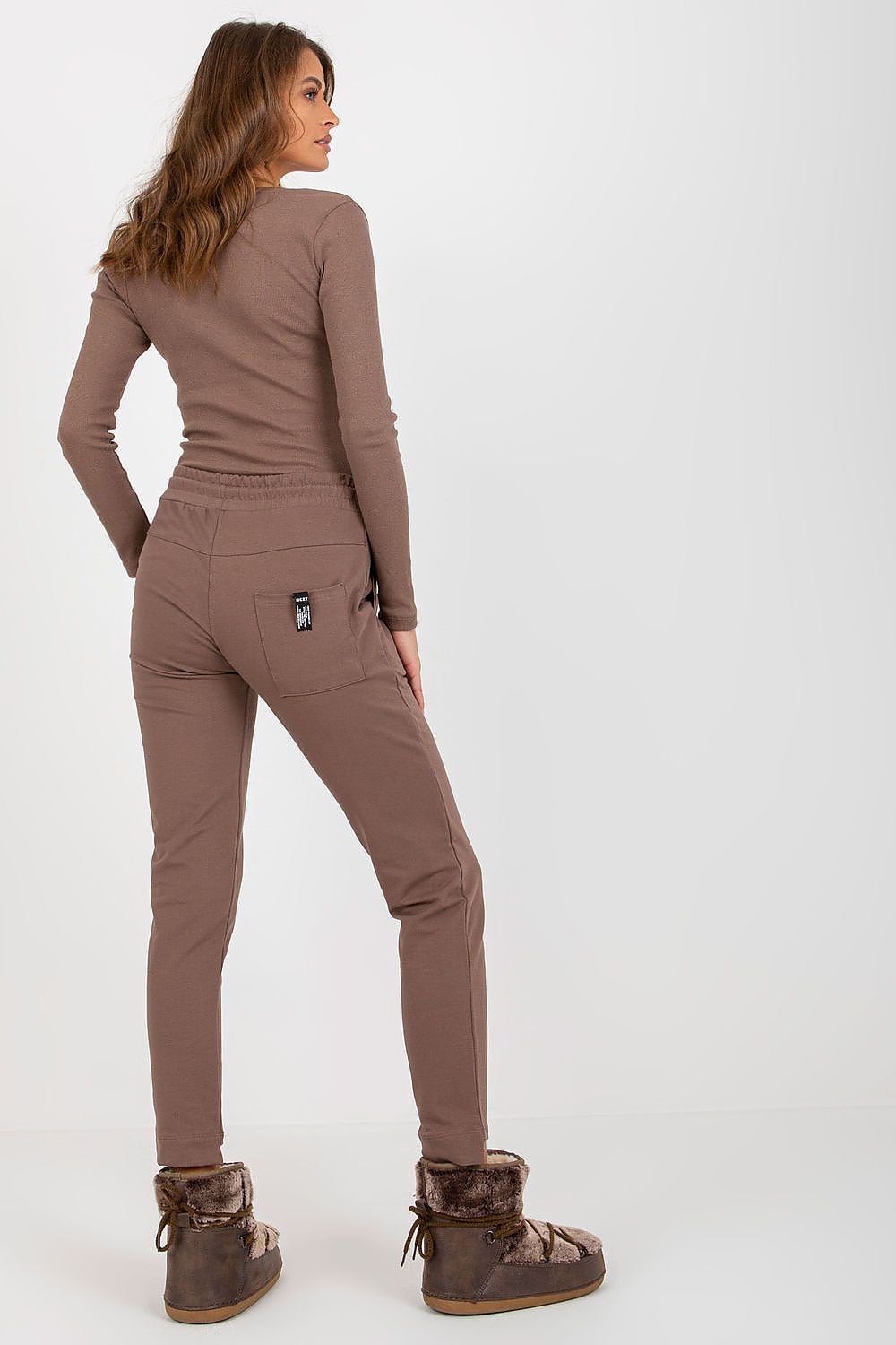 Luxury Cotton Blend Sweatpants for Women by Relevance, featuring tapered legs, adjustable waist, and side pockets, ideal for casual and sporty styles.