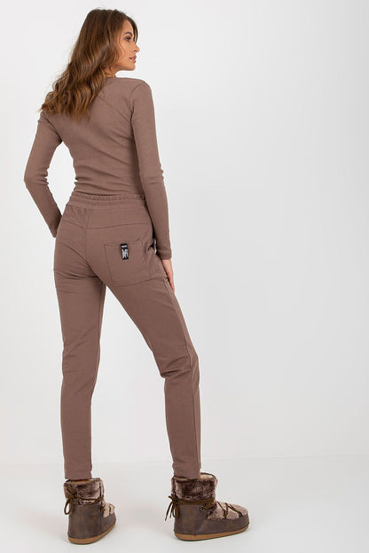 Luxury Cotton Blend Sweatpants for Women by Relevance, featuring tapered legs, adjustable waist, and side pockets, ideal for casual and sporty styles.