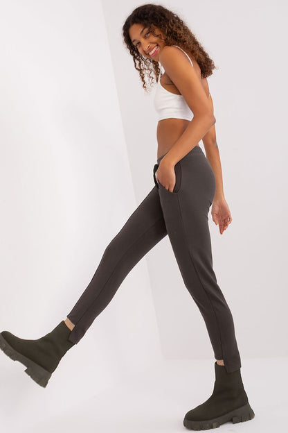Women's high waist tracksuit trousers by Relevance, designed for a flattering silhouette and perfect for casual outings.