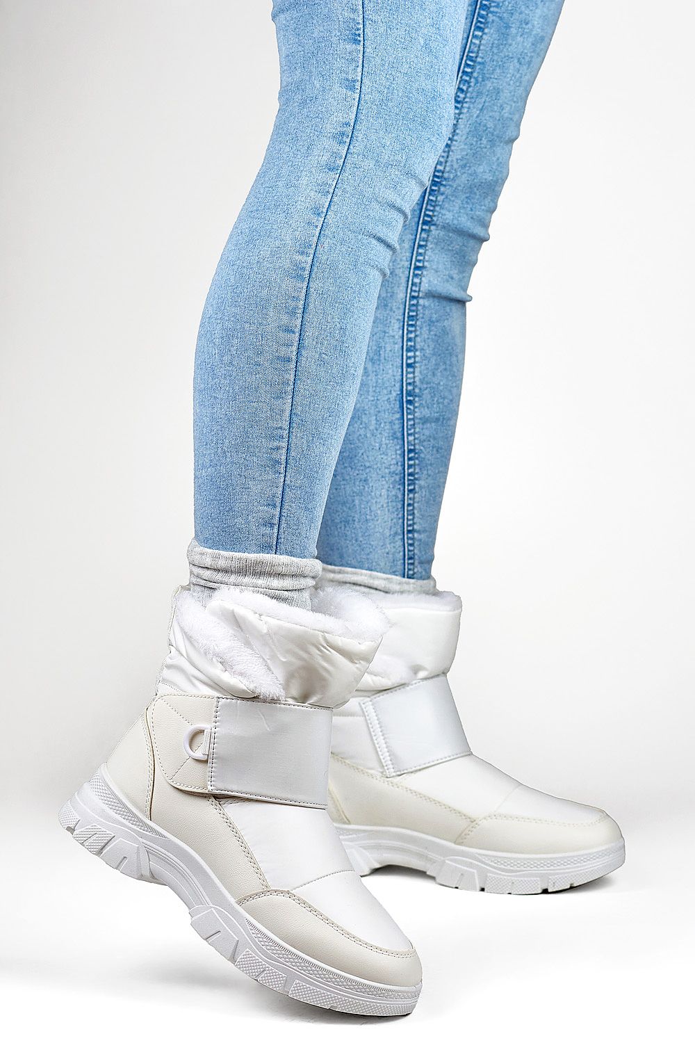 Close-up of PRIMO White Snow Boots highlighting the eco-friendly materials and rounded toe design for comfort.