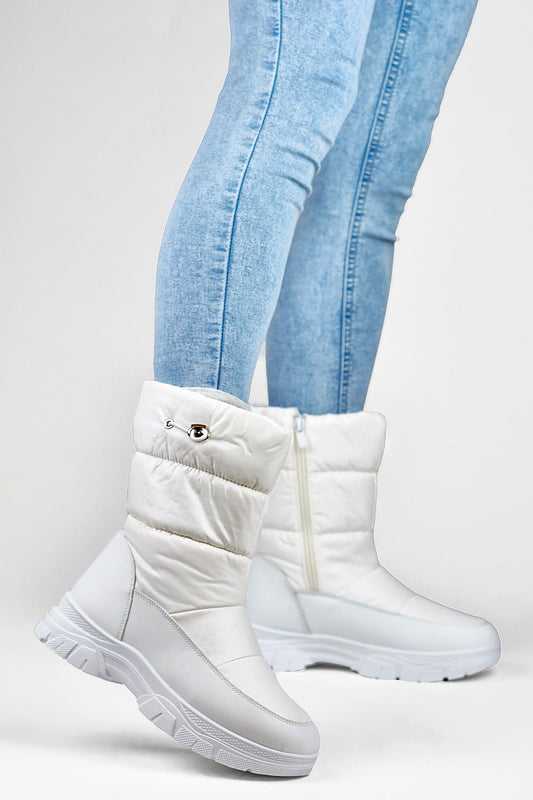 Stylish PRIMO women's insulated snow boots featuring eco leather and thick rubber sole, lined with plush fur for ultimate warmth, perfect for luxury winter elegance.