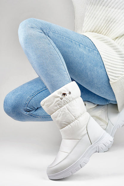 PRIMO Women's Insulated Snow Boots featuring eco leather and thick rubber sole, elegantly crafted for warmth and style this winter.