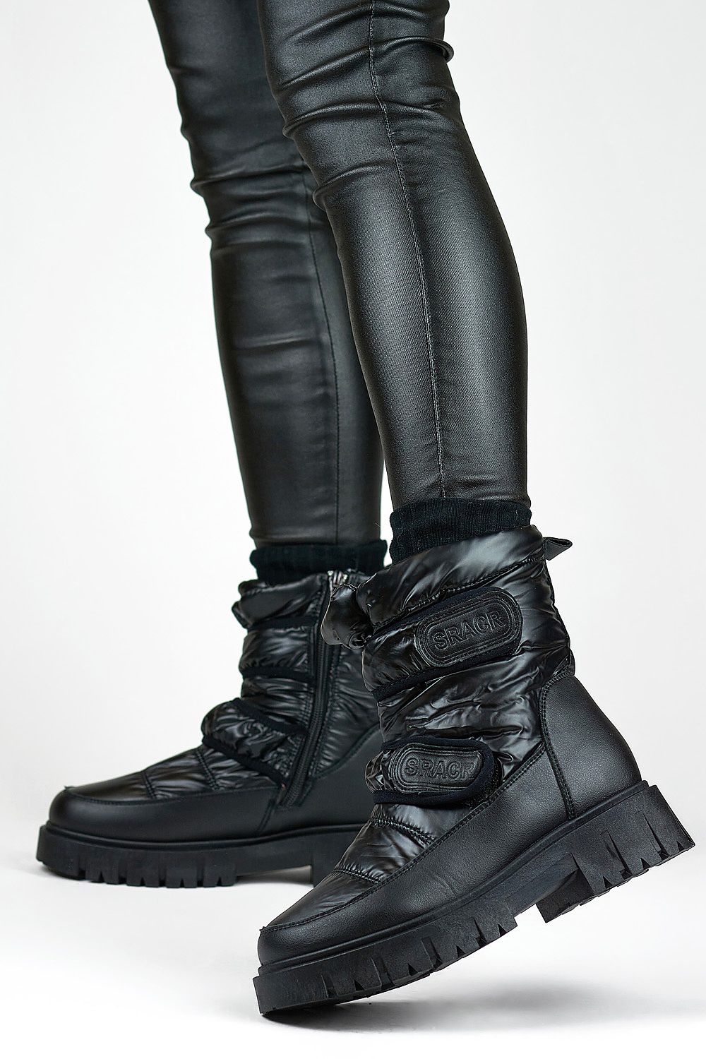Elegant PRIMO Eco Leather Snow Boots showcasing a modern round toe and practical zipper closure for effortless style.