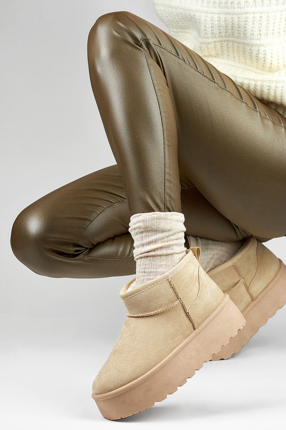 Luxury women's snow boots by PRIMO crafted from high-quality organic suede leather with insulated fur interior, ideal for cold weather.