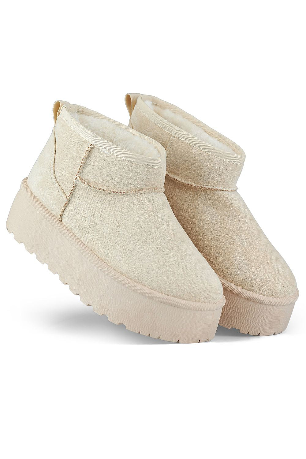 Elegant PRIMO women's snow boots, showcasing premium organic suede leather and a warm fur-lining for ultimate comfort in cold climates.