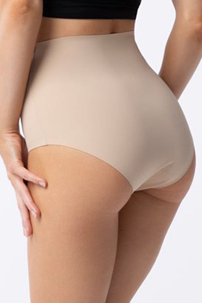 Model wearing Julimex Amber Maxi High Women's Control Panties, illustrating the high-rise design that smooths the belly and provides confidence.