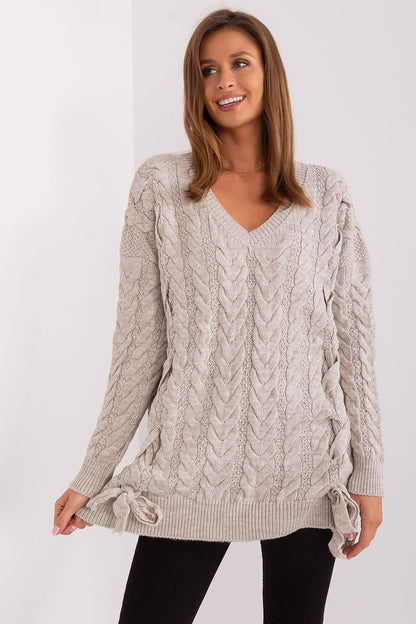 Sophisticated women's acrylic wool sweater by Badu, combining modern style with classic elegance and decorative accents.