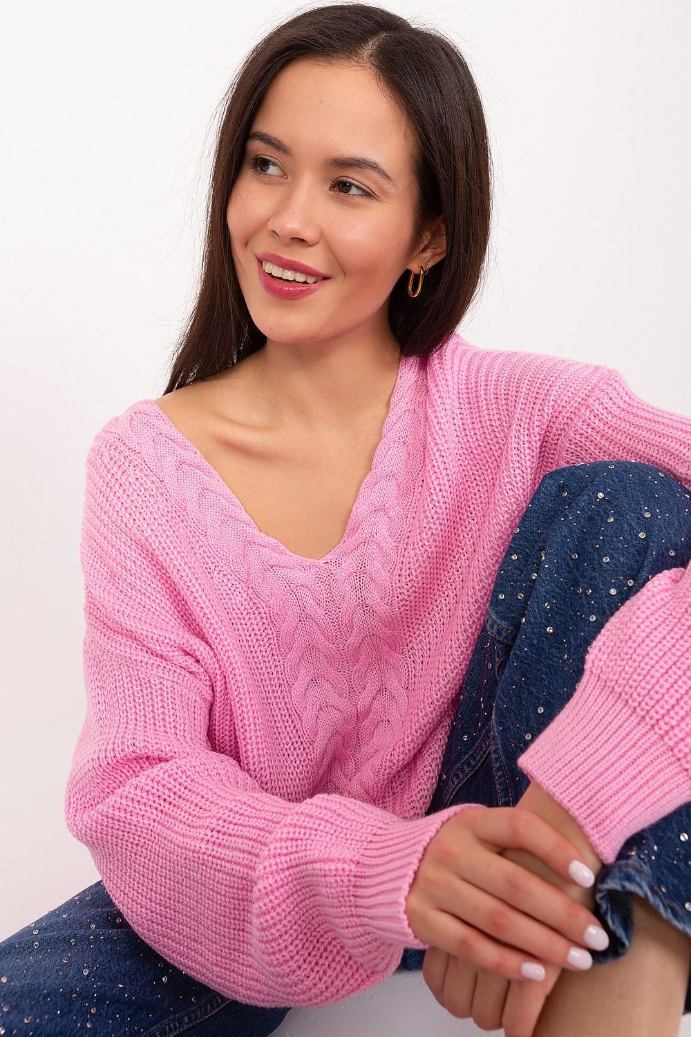 Close-up of Badu's sophisticated women's acrylic wool sweater, showcasing its unique variegated texture and elegant design, ideal for versatile outfits.