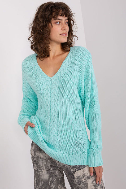 Elegant Women's V-Neck Sweater by Badu featuring a unique varied texture in a lightweight acrylic and wool blend, perfect for sophisticated everyday styling.